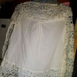 Nwot very lite white blouse with lacy sleeves and around top&bottom